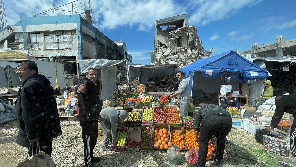 Selling vegetables and fruits inside tents in Gaza during a ceasefire of the Gaza Israel War 2023-2025. 22 February 2025 by Jaber Jehad Badwan