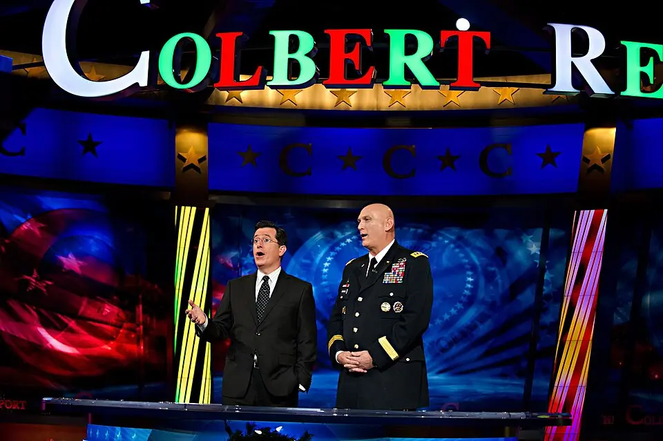 Stephen Colbert and Army Chief of Staff Gen. Raymond T. Odierno pay tribute to the homecoming troops of the Iraq war with an a cappella rendition of "I'll Be Home for Christmas" during the recording of the Colbert Report in New York City on December 14, 2011. U.S. Army photo by Staff Sgt. Teddy Wade