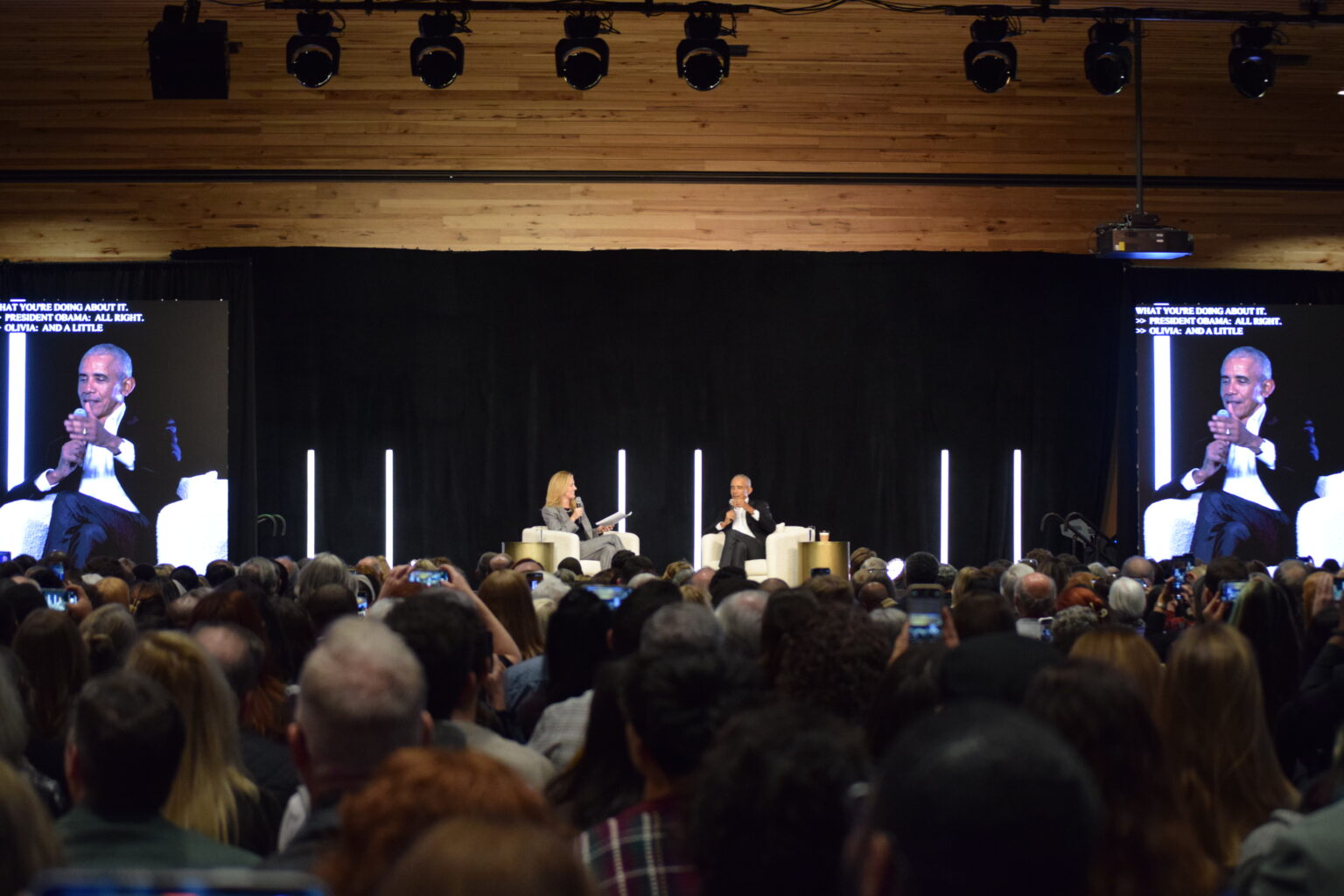 Olivia Walton, board chair of Crystal Bridges Museum of American Art, interviews former President Barack Obama in Bentonville on Dec. 1, 2025 as part of new lecture series. (Photo by Antoinette Grajeda/Arkansas Advocate)