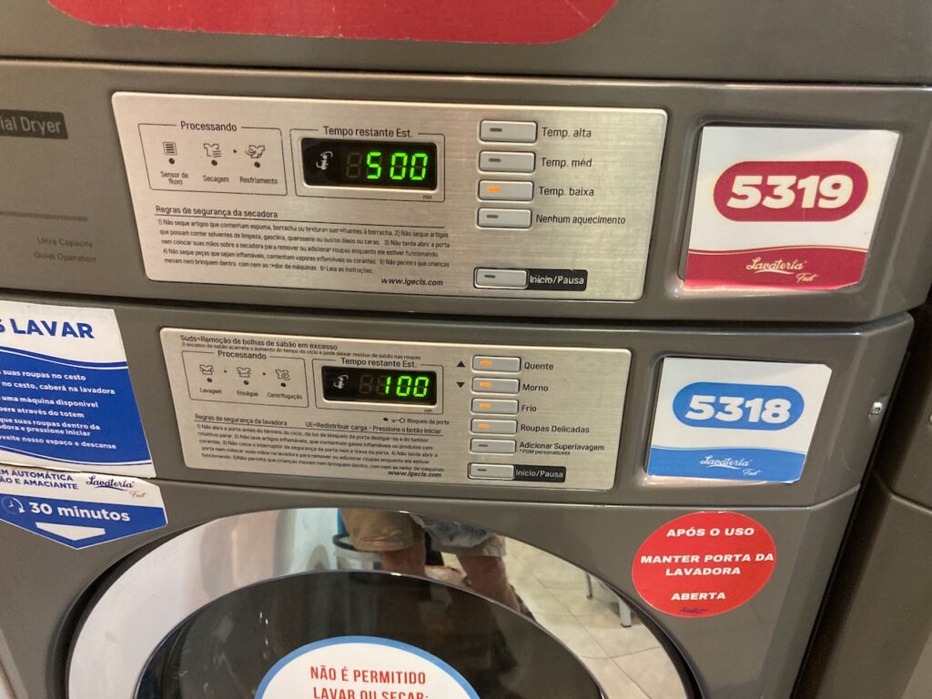A view of a washer and dryer machine panel in the Lavateria Fast Shopping Center 3 self service laundromat in São Paulo