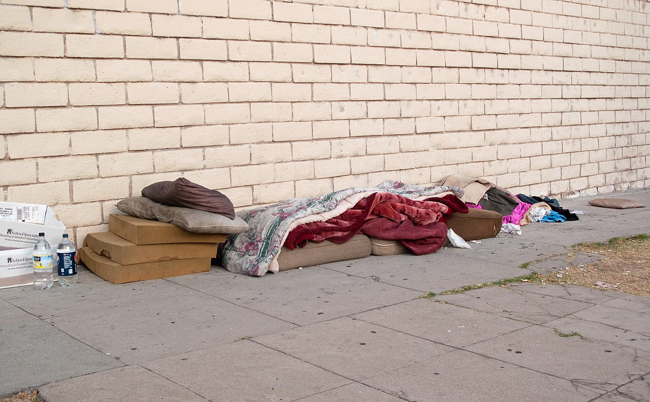 Bed, bedclothes and clothing of a homeless person who sleeps on the street. Los Angeles. 31 August 2013. Bed, bedclothes and clothing of a homeless person who sleeps on the street. Los Angeles. 31 August 2013.