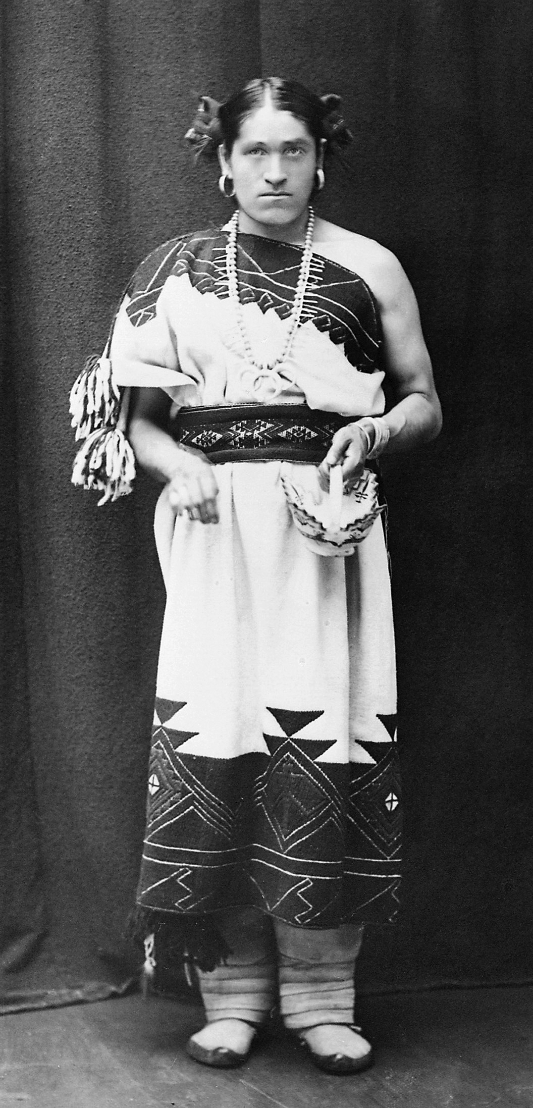 We-Wa,_a_Zuni_berdache,_full_length_portrait_-_NARA_-523798_contrast_clean We'Wha, a Zuni berdache, full length portrait. Circa 1871 - 1896. Smithsonian Institution. Bureau of American Ethnology. Public Domain via Wikimedia Commons.